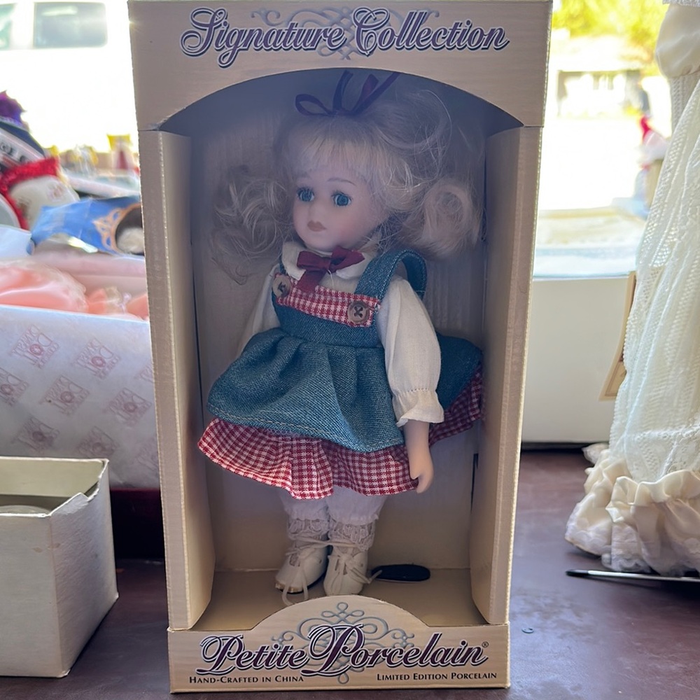 Porcelain Doll in Blue and Red Dress